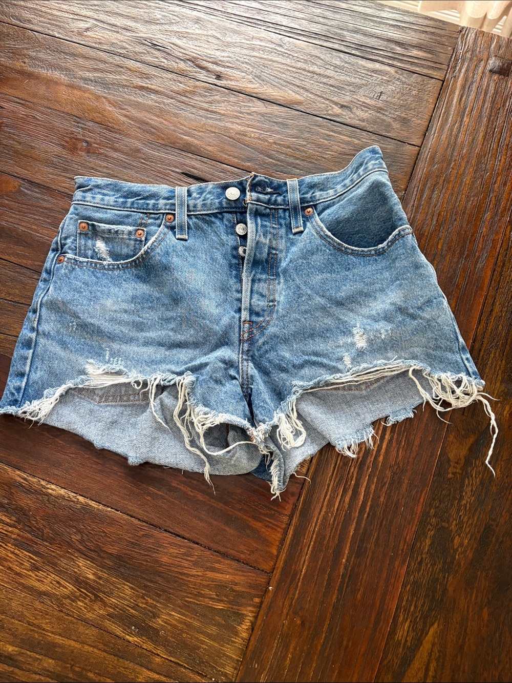 Levi's Distressed Light Blue Cutoff Jean Shorts